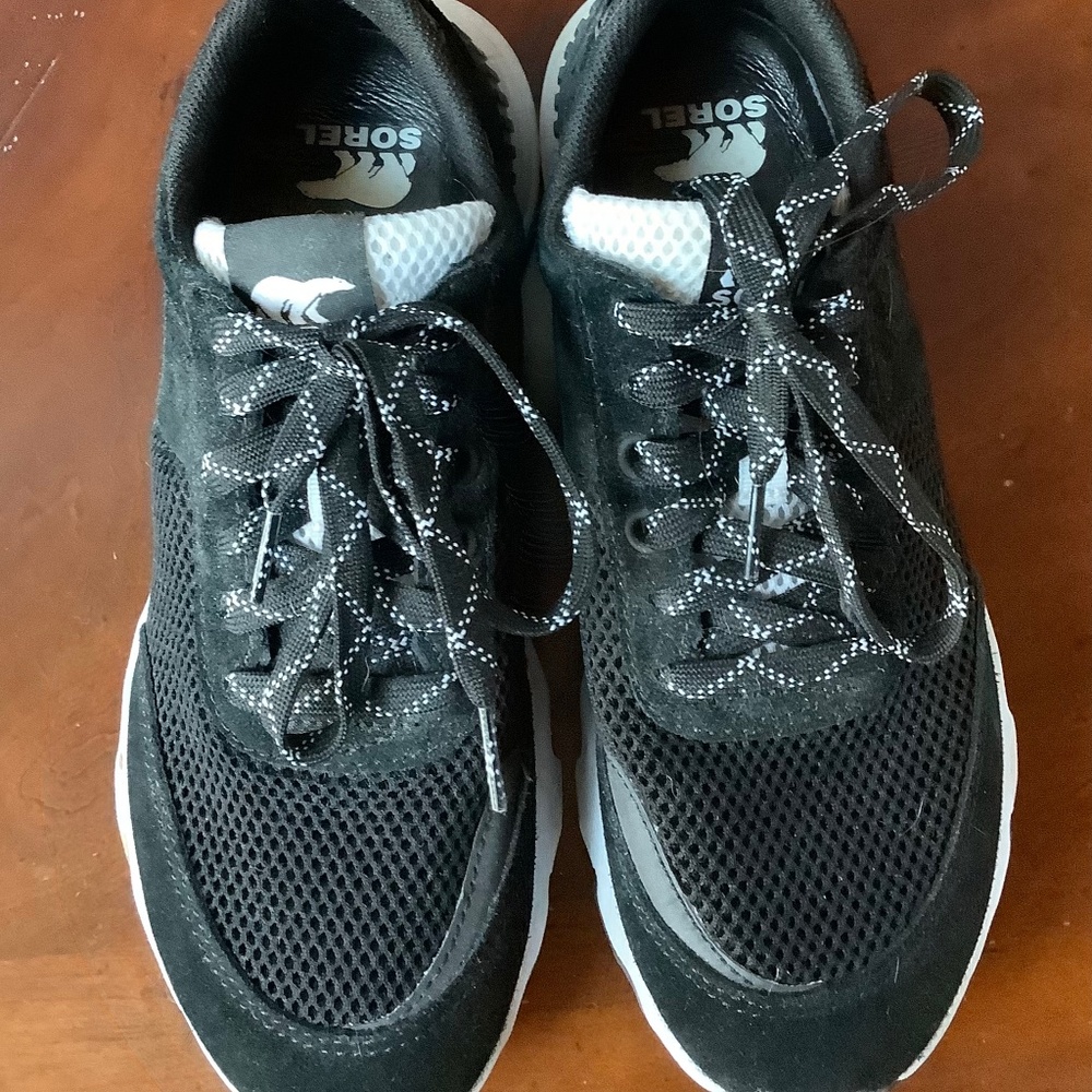 Womens 7.5 SOREL athletic shoes. Black white